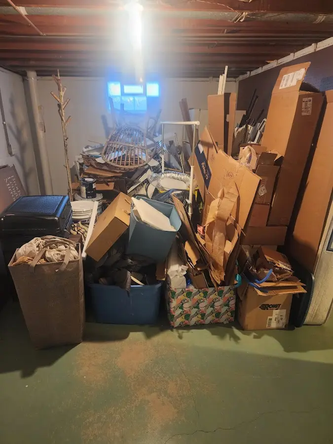 Roll-off dumpster container at job site for 6 Yard Dumpster Rental in East Lansing